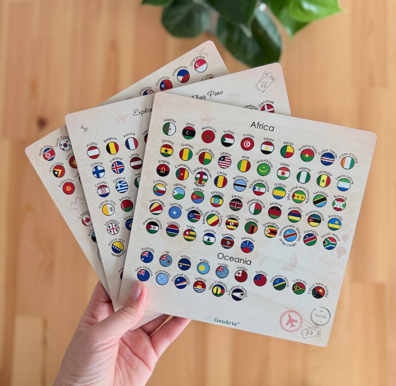 geo arte - world flags on a wooden surface